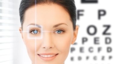 Woman in front of an eye chart