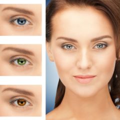 Woman with examples of colored contact lenses