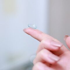 Contact lens on finger